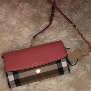 Burberry clutch/wallet. Can be used either way.